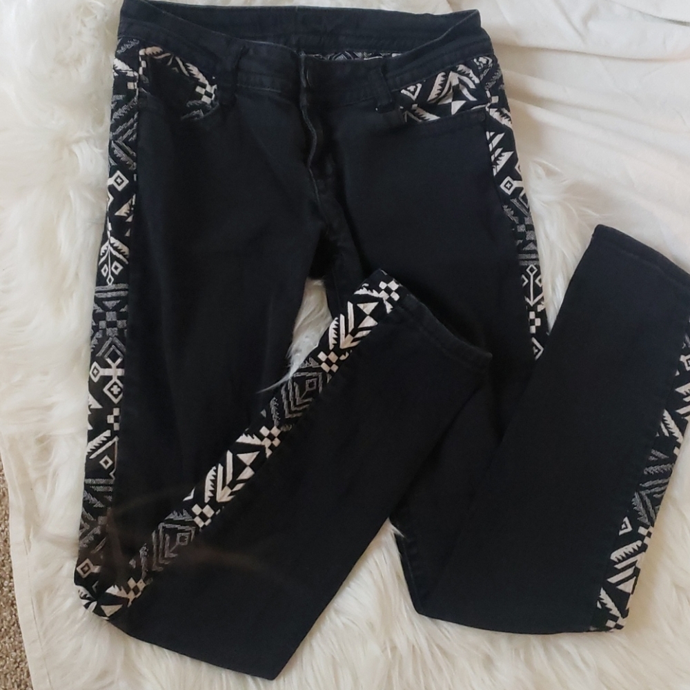 Dark wash jeans with tribal embroidery